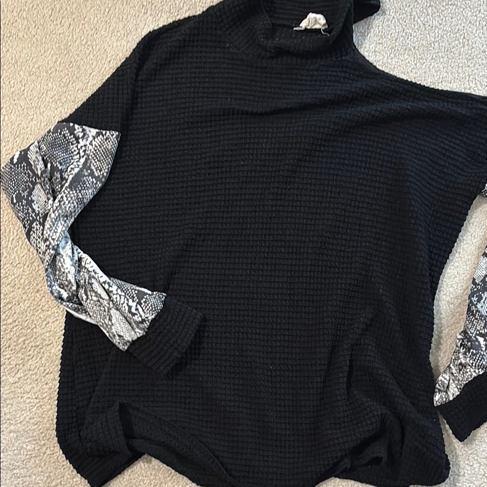 Chic Black Top with Snake Print Sleeves